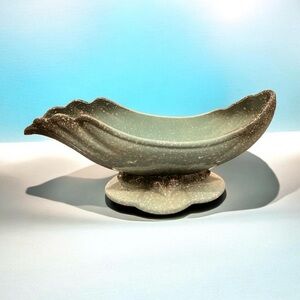 Vintage Hull Pottery, speckled aqua glaze with an organic flowing form.